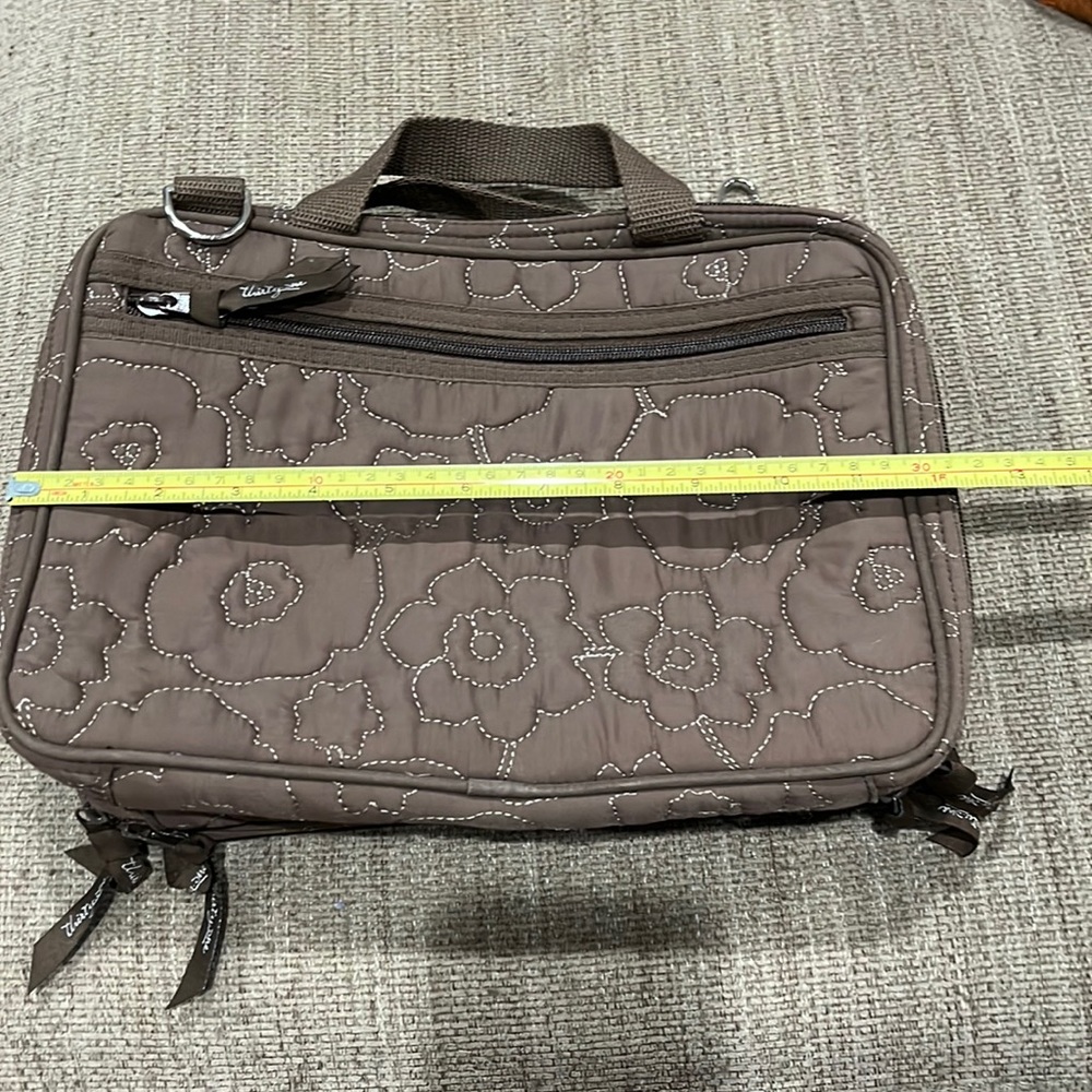 Thirty-one makeup bag. Brown floral embroidery. Multiple pockets and pouches.